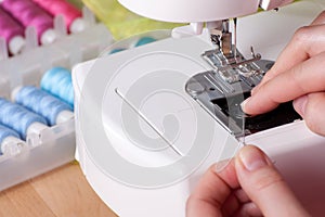 Threading a Needle in Sewing Machine