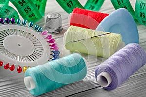 Threads colored and needle reel all for sewing