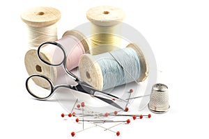 Threads in pastel with scissors