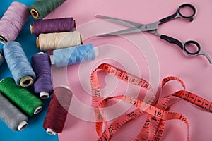 Threads  scissors and mesure tape.