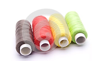 threads for sewing on a white background