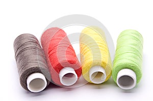 Threads for sewing on a white background