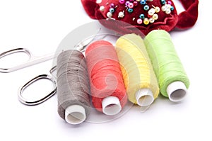 Threads for sewing on a white background
