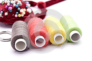threads for sewing on a white background