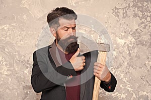 Threat to debtors. Brutal bearded man with axe. Debt collection is process of pursuing payments of debts owed by