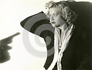 Threatened at gunpoint