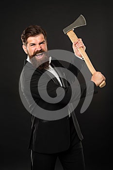 Threatening and angry screaming. Angry guy scream threaten with axe. Bearded man hold hatchet