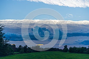 Threatening cloud formations  in the sky from the coming storm, while the blue of the sky is still visible