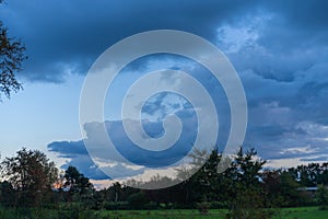 Threatening cloud formations  in the sky from the coming storm, while the blue of the sky is still visible