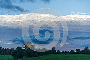 Threatening cloud formations  in the sky from the coming storm, while the blue of the sky is still visible