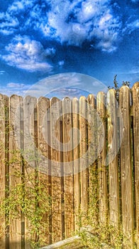 Threatening Stormy Sky and Security Fence