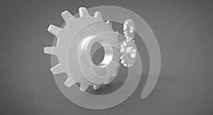 Three 3D cogs on grey gray background