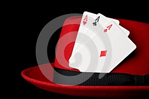 Three aces on felt hat; concept for gambling