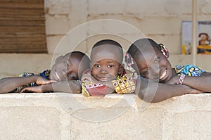 Three Adorable African Children Posing Outdoors Copy Space