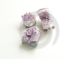 Three Amethyst geodes for crystal therapy treatments and reiki photo