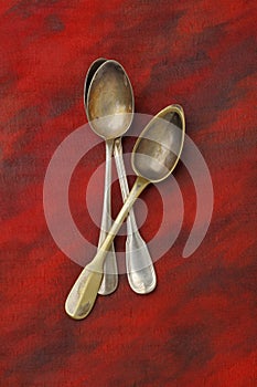 Three antique silver spoons