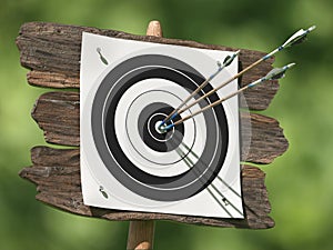 Three arrows on an archery target