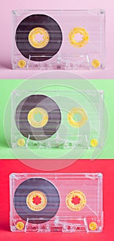 Three audio cassettes on difrent backgrounds