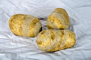 Three backer`s potato`s ready to cook