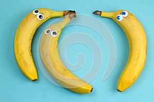 three bananas with googly eyes