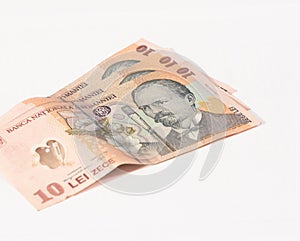 Three banknotes worth 10 Romanian Lei isolated on a white background