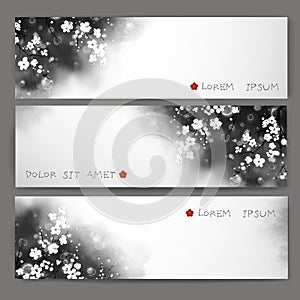 Three banners with sakura cherry flowers on dark background. Traditional oriental ink painting sumi-e, u-sin, go-hua.