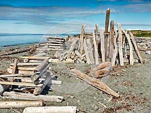 Three Beach Shelters Of Driftwood