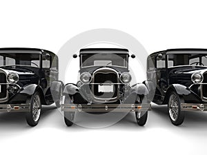 Three beautiful 1920s vintage cars - front view cut shot