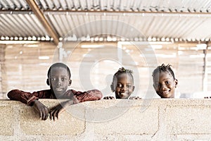 Three Beautiful African Girls and Boys Posing Smiling at Camera Laughing and Having Fun