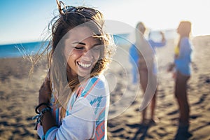 Beautiful girls having fun on the beach