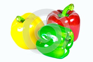 Three bell peppers isolated on white background