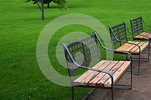 Three benches in park