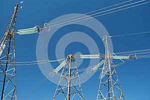 Three big electric power transmission towers