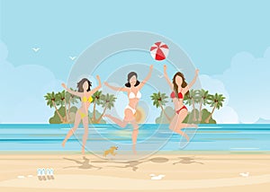Three bikini woman jumping with ball on beautiful beach on tropical vacation.