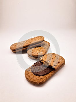 three biscuits with chocolate cream
