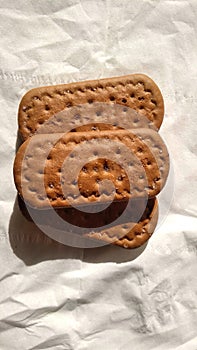 Three biscuits sandwich on a white background