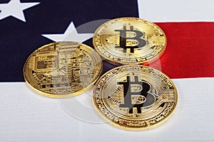 Three bitcoins on the usa flag