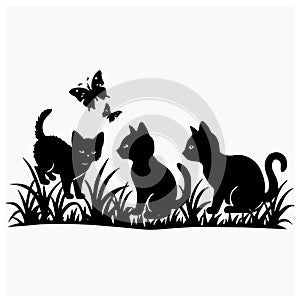 three black cats playing with butterflies in the grass