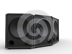 Three black subwoofer speakers