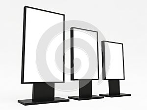 Three blank monitors on stands isolated on white background