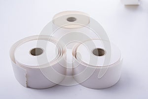 Three blank roll paper for cashiers on white