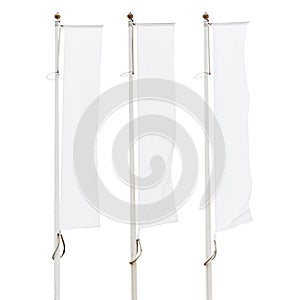 Three blank white corporate flags on flagpoles isolated on white background