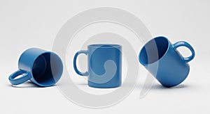 Three Blue Ceramic Mugs in Different Poses on a White Background coffee cup tea cup