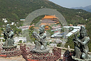 Three bodhisattva sculptures at the Po Lin Monastery, Lantau Island, Hong Kong, China.