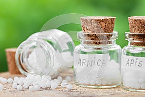 Three bottles of homeopathy globules