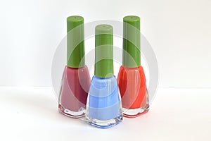 Three bottles of nail polish