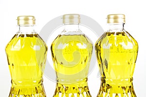 Three bottles oil of refined palm olein from pericarp