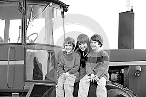 Three Boys on a Tractor