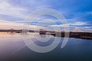 Three bridges, Forth railway Bridge, Forth Road Bridge and Queensferry Crossing, over Firth of Forth near Queensferry in Scotland