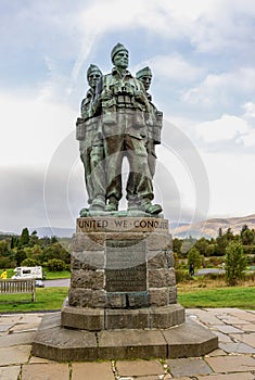 Three British commandos of the Commando Memorial looking towards Ben Nevis mountain near Spean Bridge village in Scottish Highland